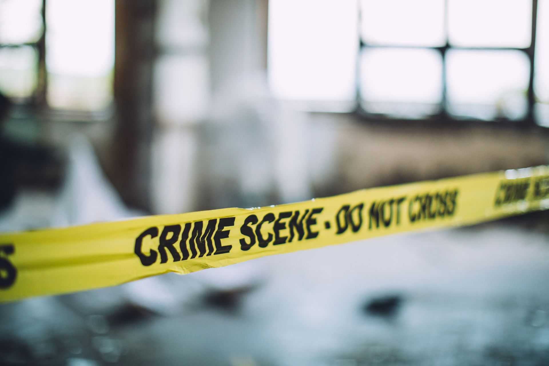 Cordon tape on a crime scene.