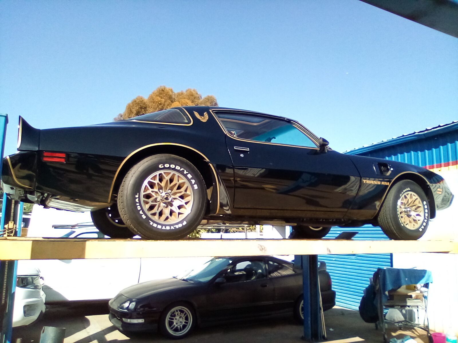 A Black Car is Sitting on Top of a Stack of Cars — San Diego, CA — Dualtone Automotive