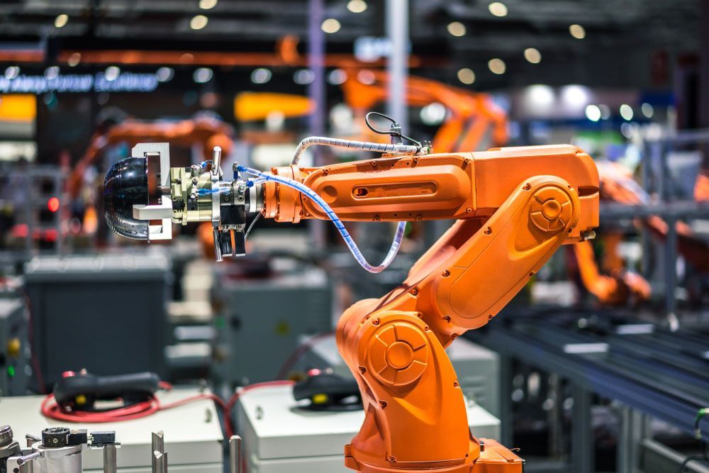 Orange Factory Robot with Claws — Industrial Automation Australia in Darwin, NT