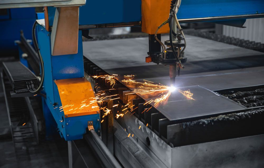 A Machine Is Cutting A Piece Of Metal In A Factory — Industrial Automation Australia in Eagle Farm, QLD
