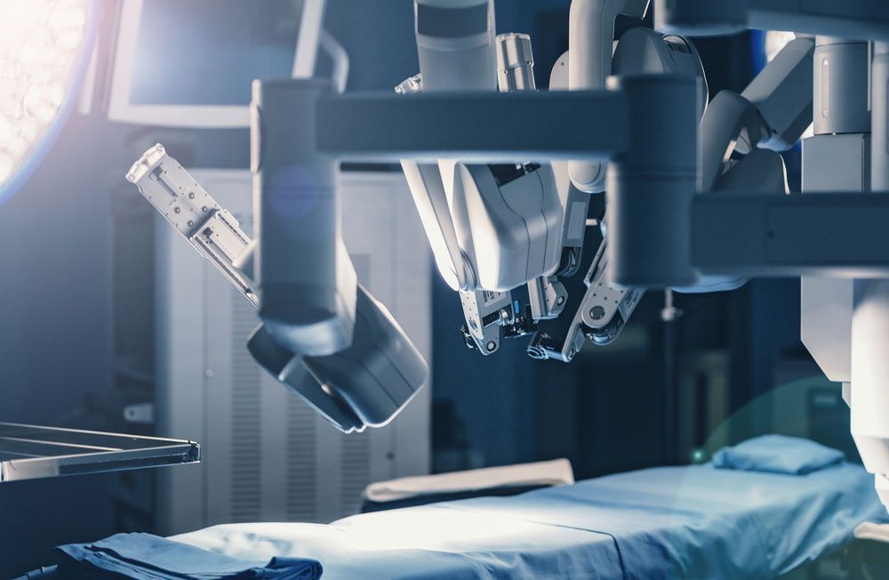 A Robot Is Operating A Patient In An Operating Room — Industrial Automation Australia In Eagle Farm, Qld