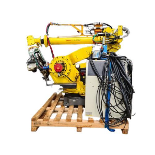 A yellow robot is sitting on a wooden pallet — Industrial Automation Australia in Eagle Farm, QLD