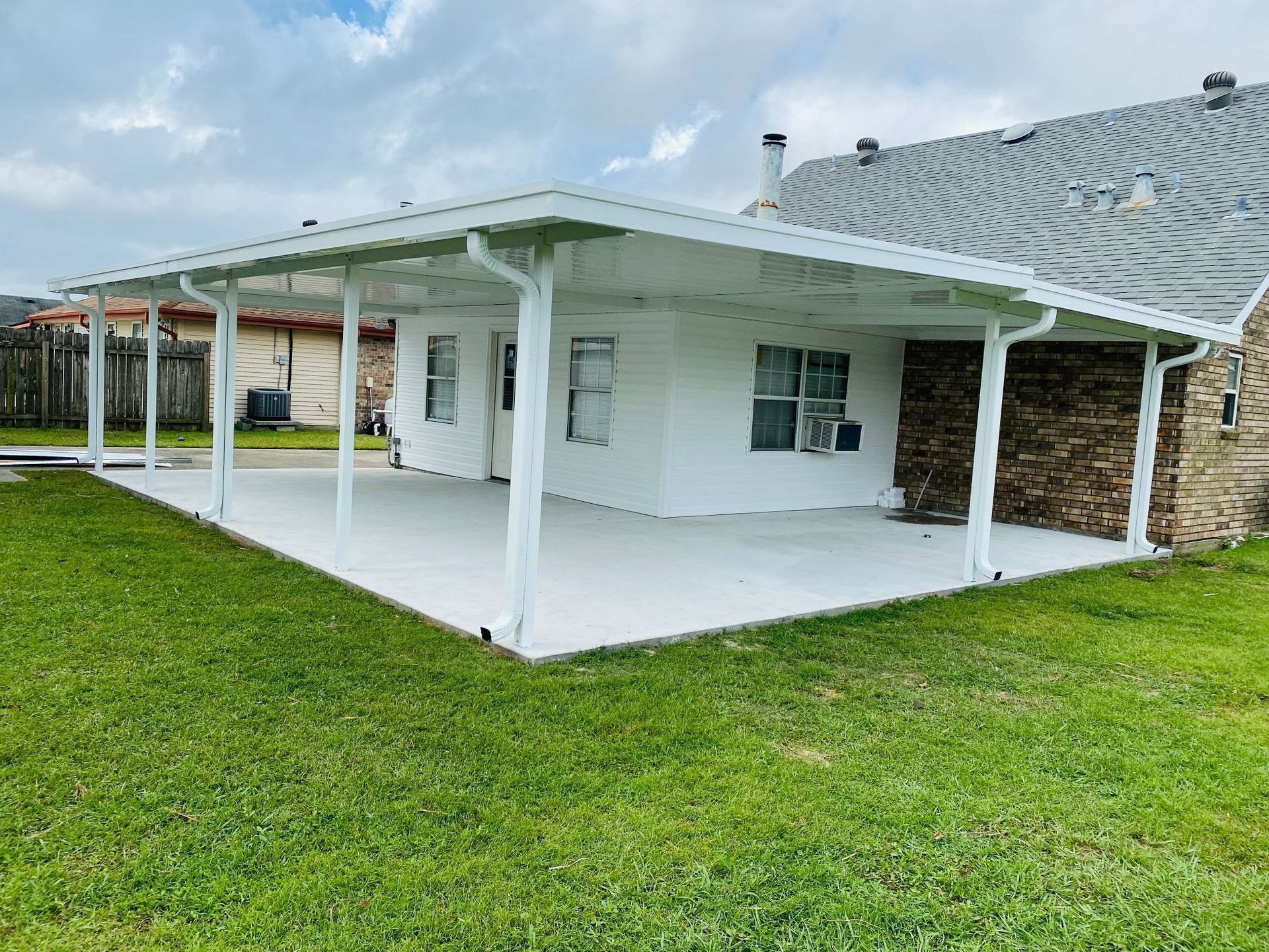 Transforming Outdoor Spaces The Dual Magic of Gutters and Patios