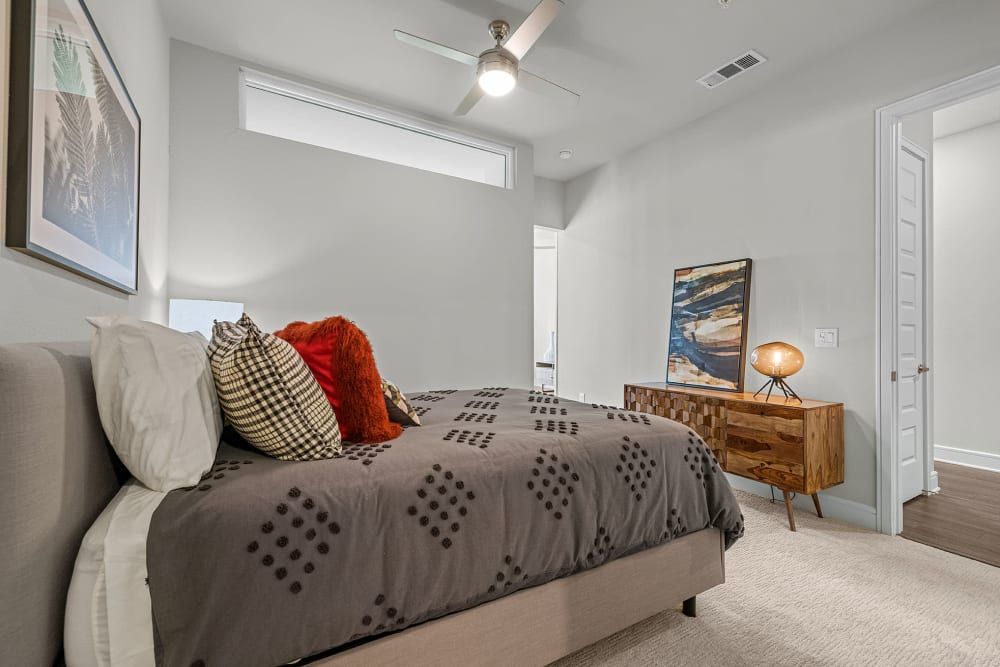 Spacious Bedroom with Ceiling Fan at The Clark