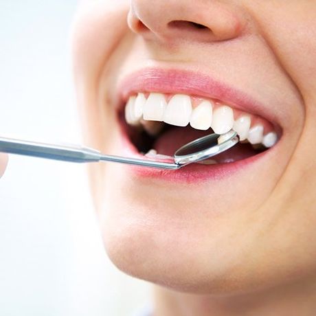 Woman Having A Dental Checkup — Burleigh Denture Clinic in Burleigh Heads, QLD