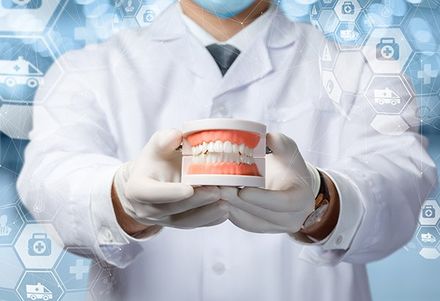 Dental Prosthetist Showing Dentures — Burleigh Denture Clinic in Burleigh Heads, QLD
