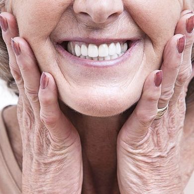 Old Woman Smiling — Burleigh Denture Clinic in Burleigh Heads, QLD
