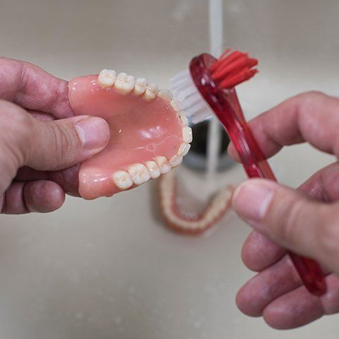 Dentures Cleaning — Burleigh Denture Clinic in Burleigh Heads, QLD