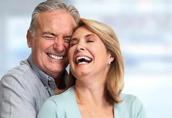 Happy Couple — Burleigh Denture Clinic in Burleigh Heads, QLD