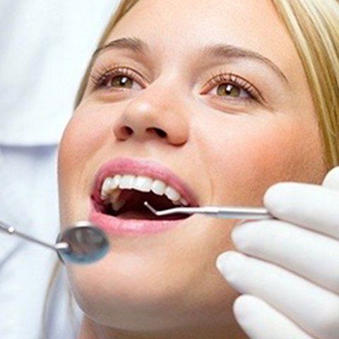 Dental Prosthetist Doing Dentures — Burleigh Denture Clinic in Burleigh Heads, QLD