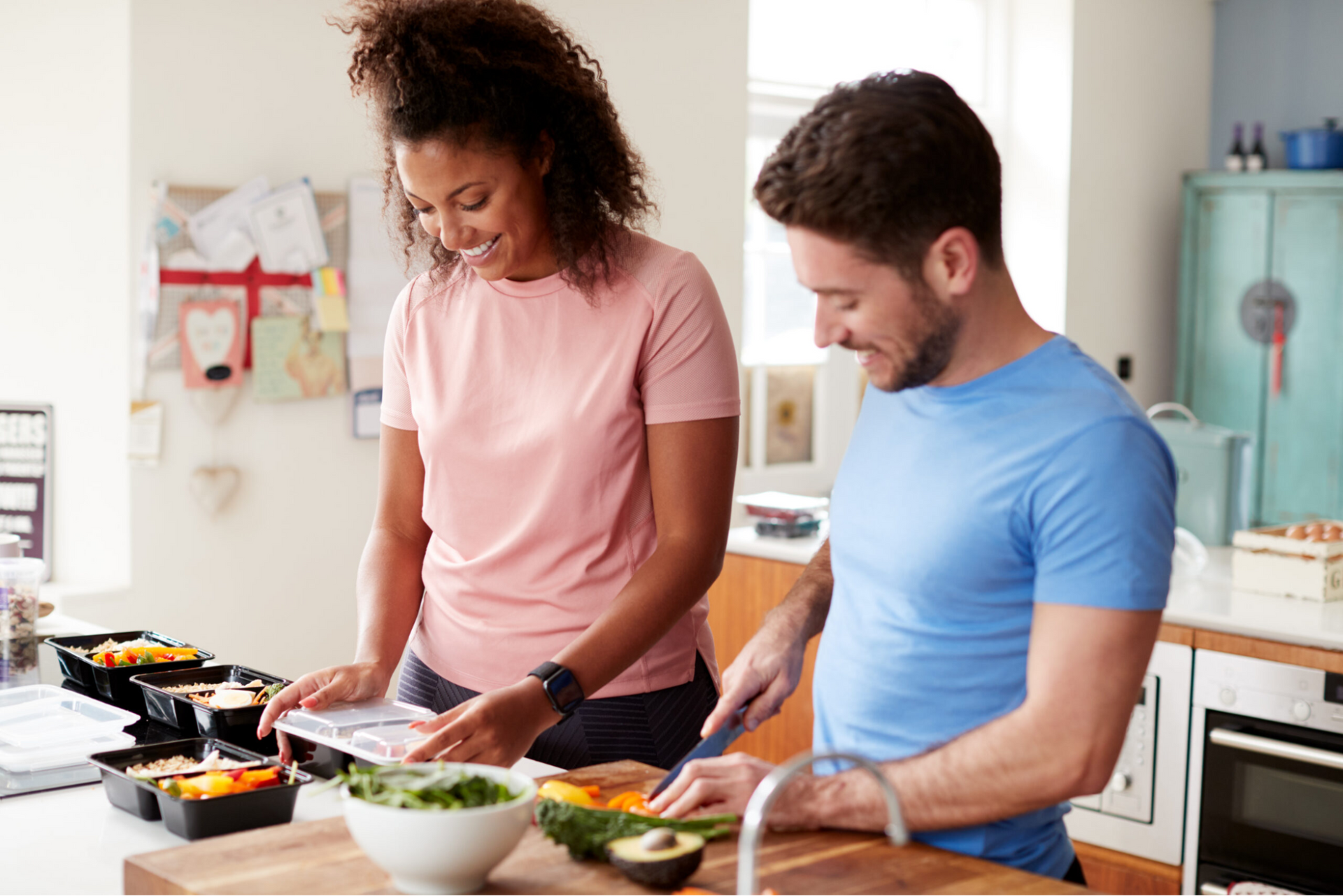 A couple preparing healthy meals for a healthy lifestyle after bariatric surgery