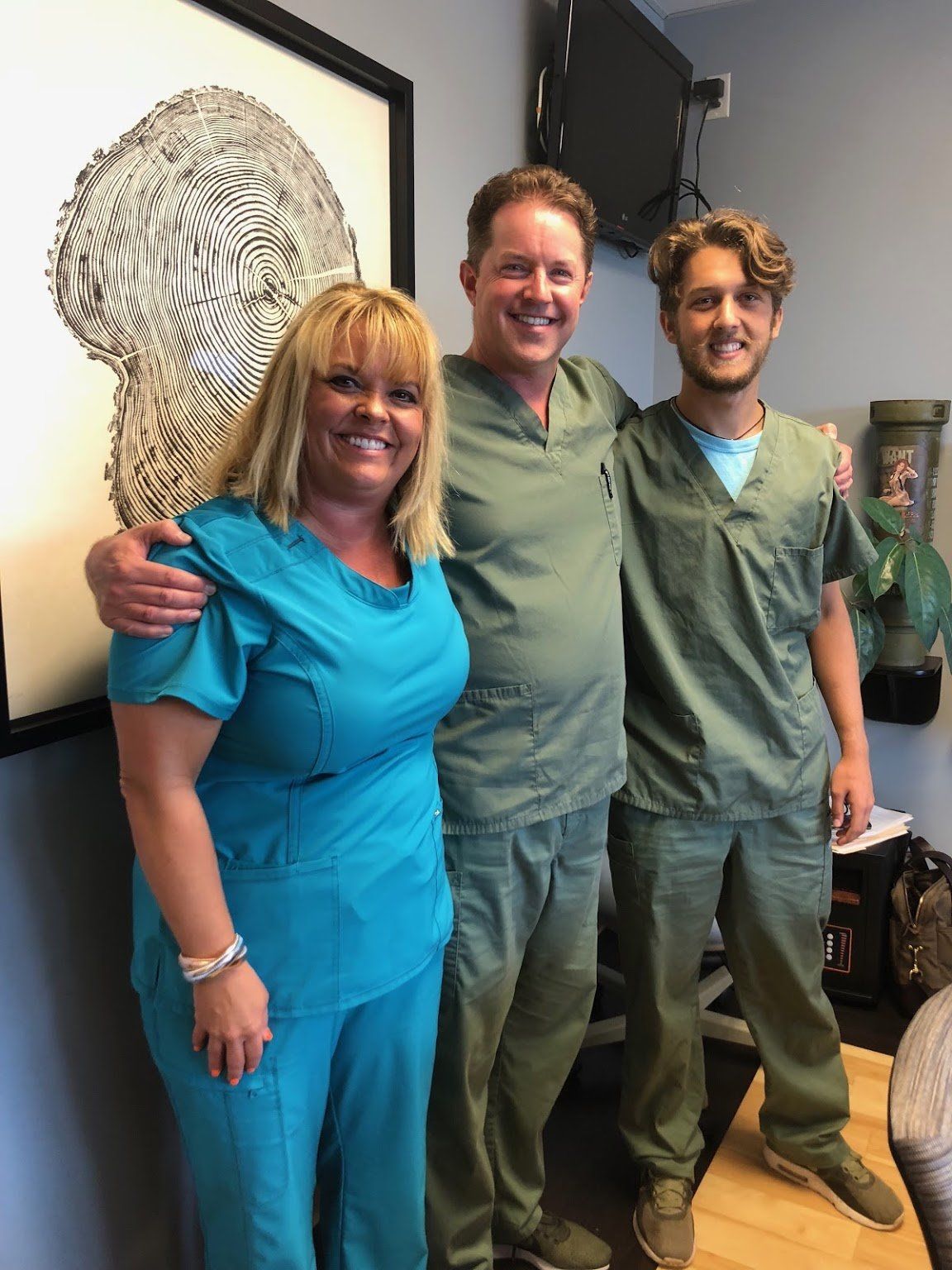 Three People Smiling — Greenville, TN — Unity Urology