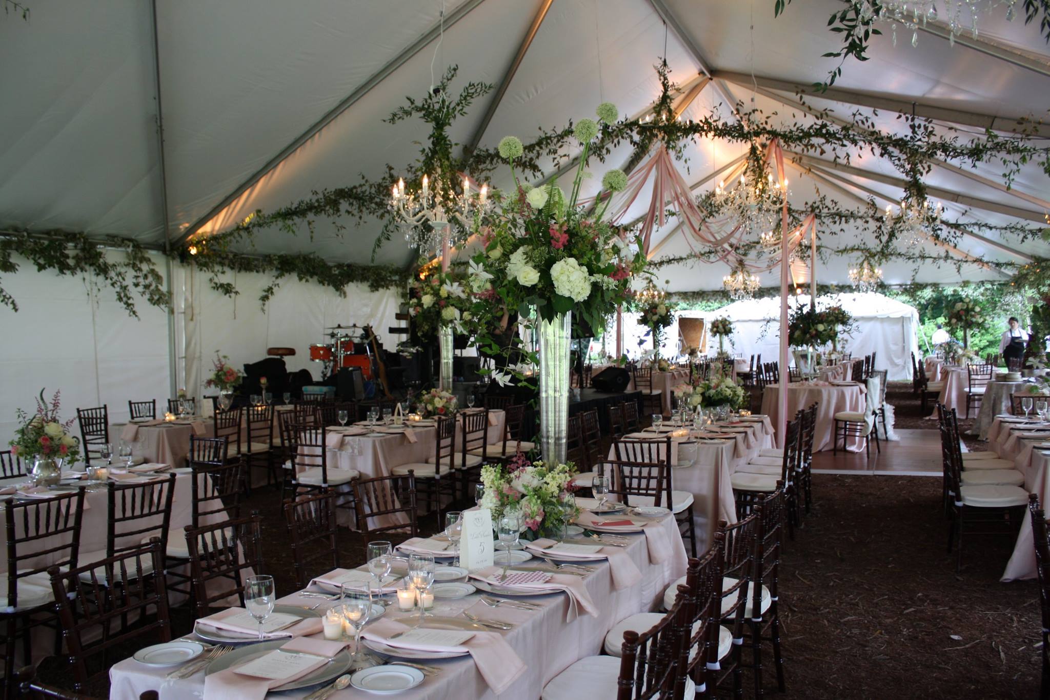 dining reception inside tent at a wedding venue in central arkansas