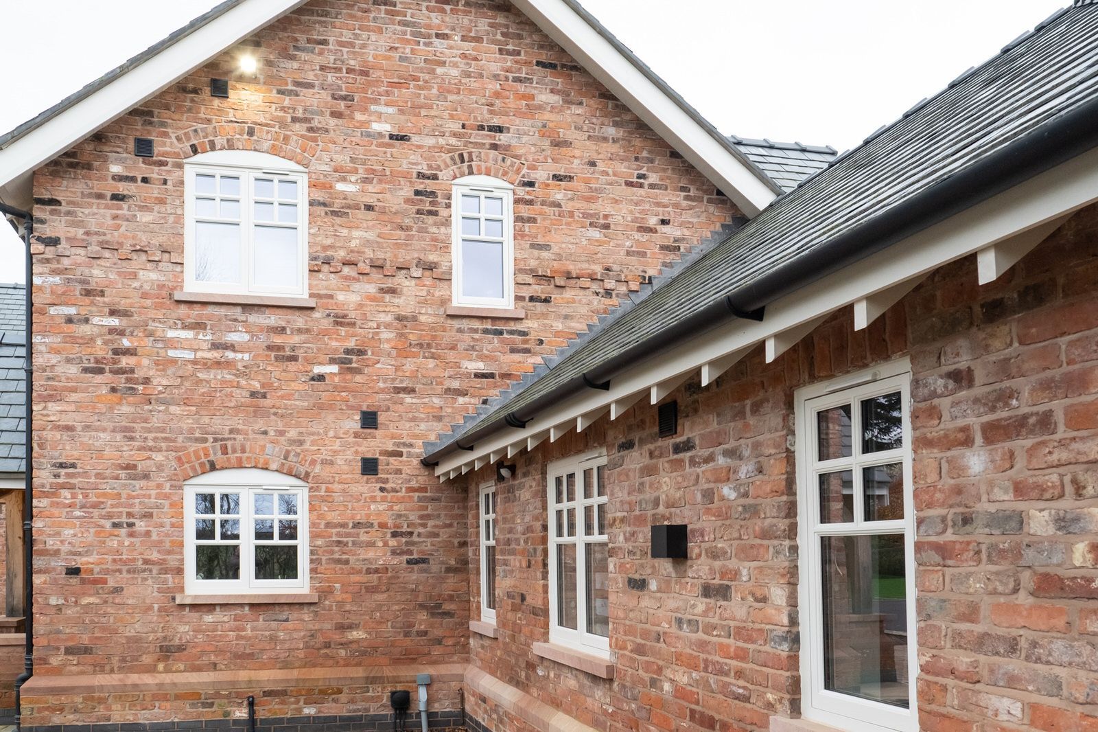 Close-up of the traditional-style build of a modern, new-build home in Cheshire