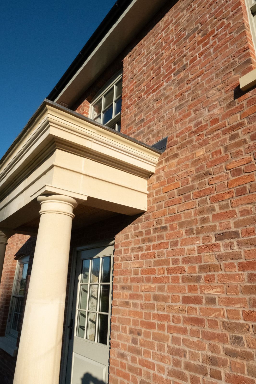 Close-up of brick and stonework on new farmhouse by Rawlinson Construction