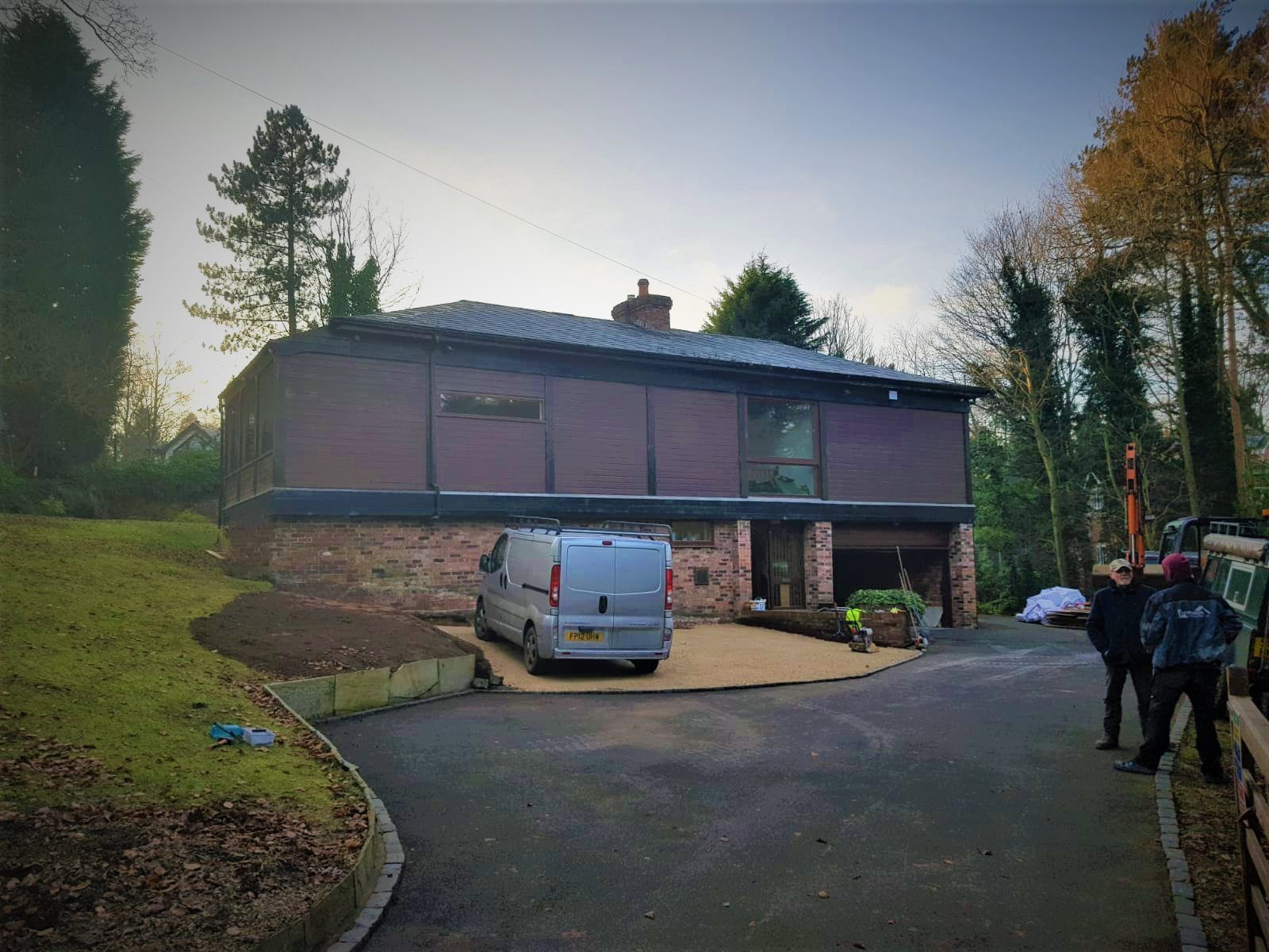 Exterior view of refurbished timber-frame home, completed by Rawlinson Construction