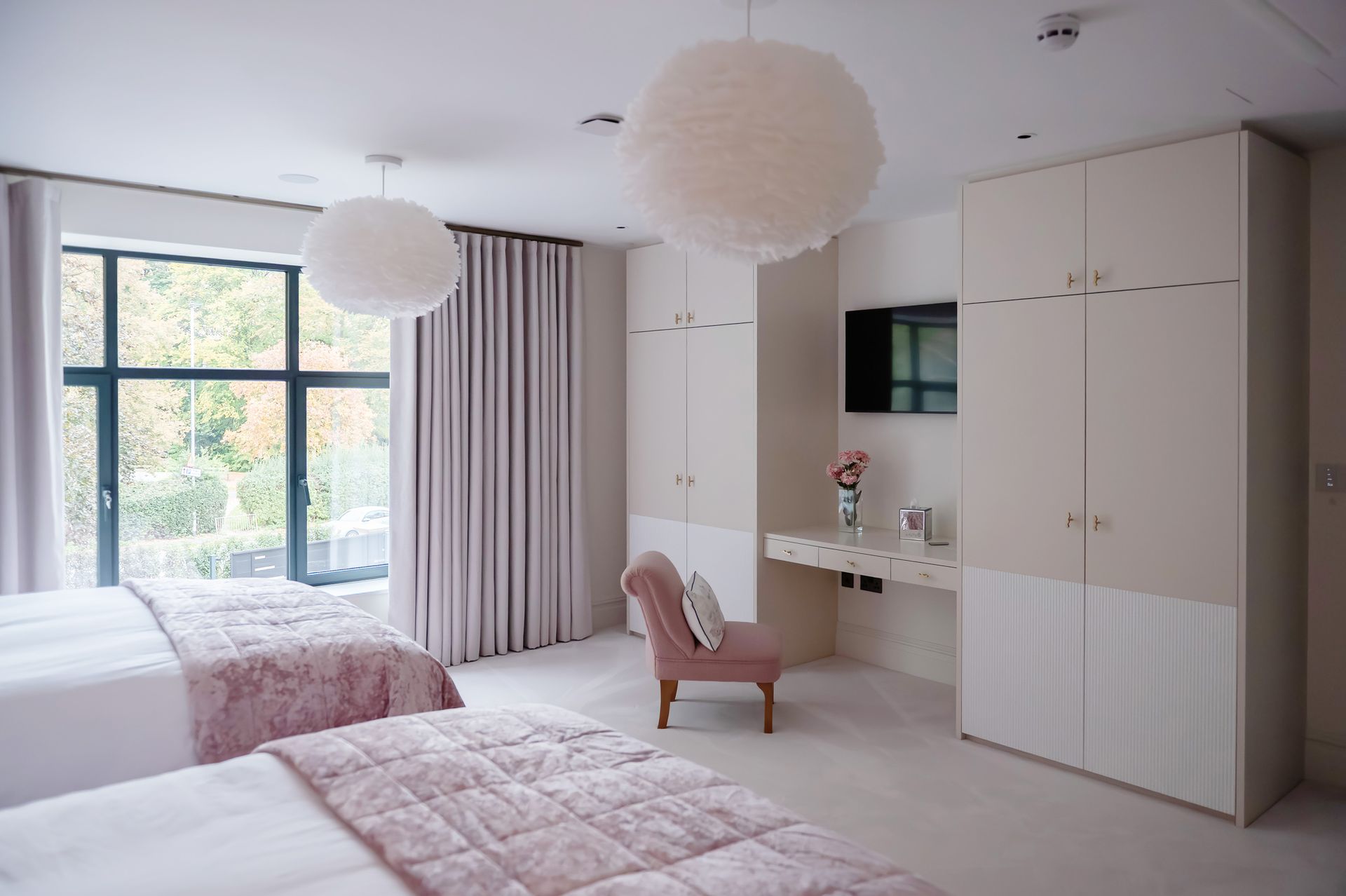 Bedroom featuring modern finishes in Sandbach home completed by Rawlinson Construction