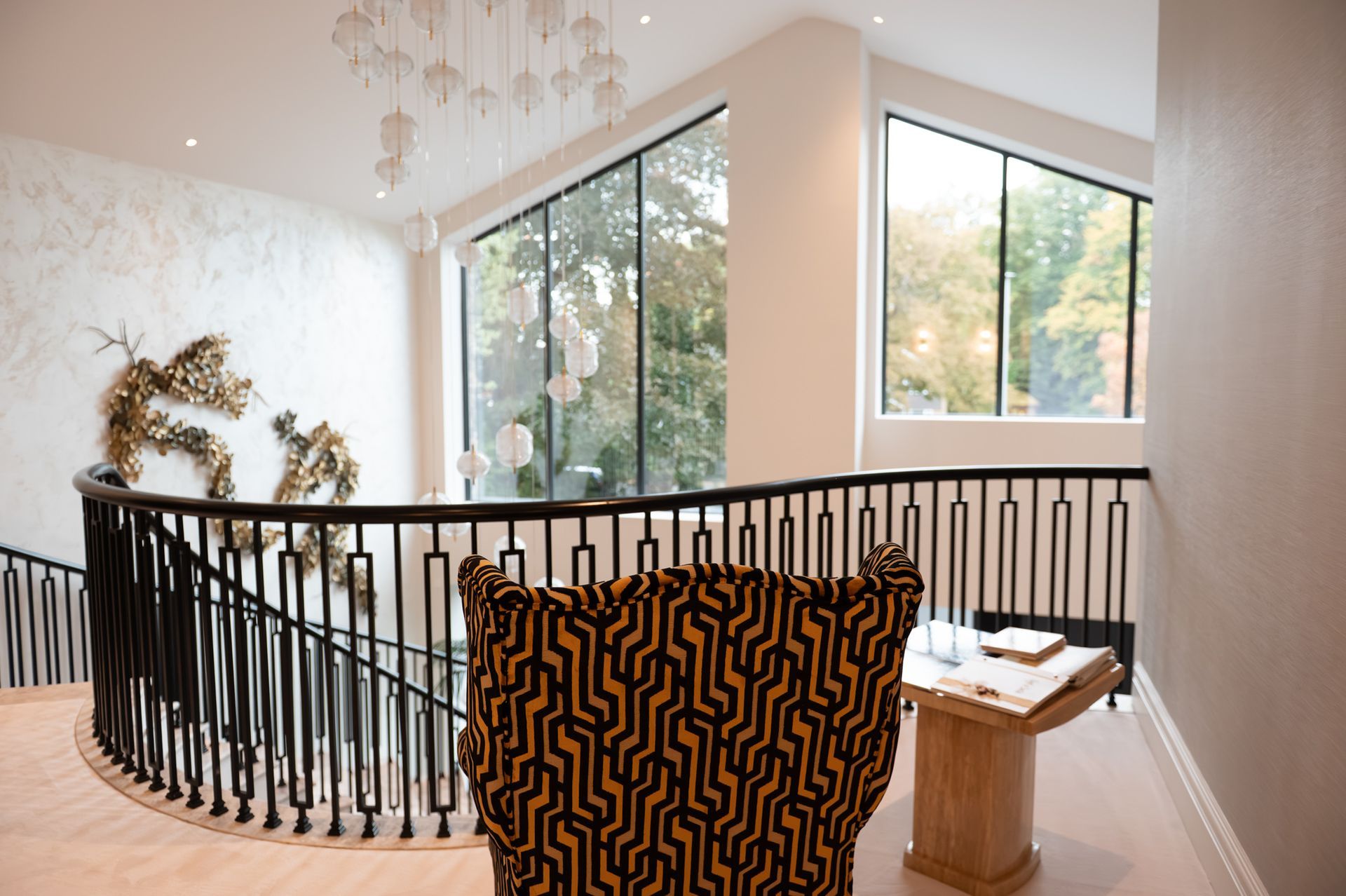 First-floor landing area showcasing craftsmanship and contemporary design in luxury new build home by Rawlinson Construction