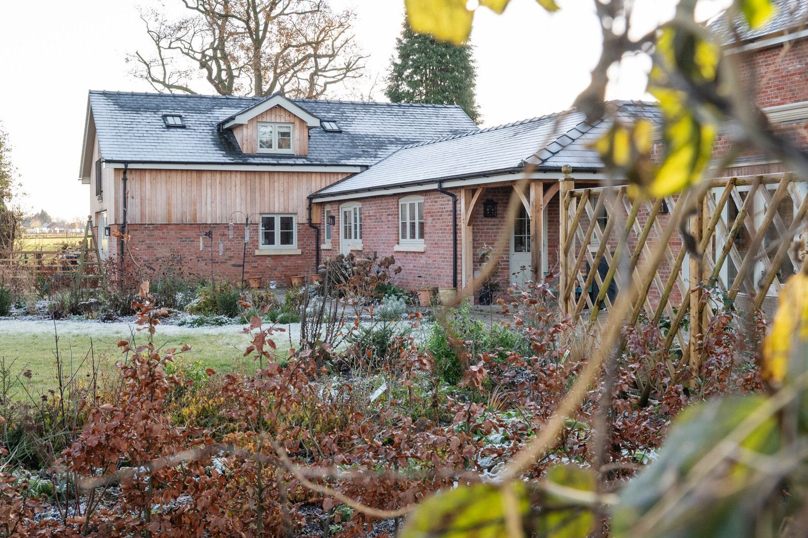 Comprehensive site redesign including house, stables, and farm barn in Cheshire