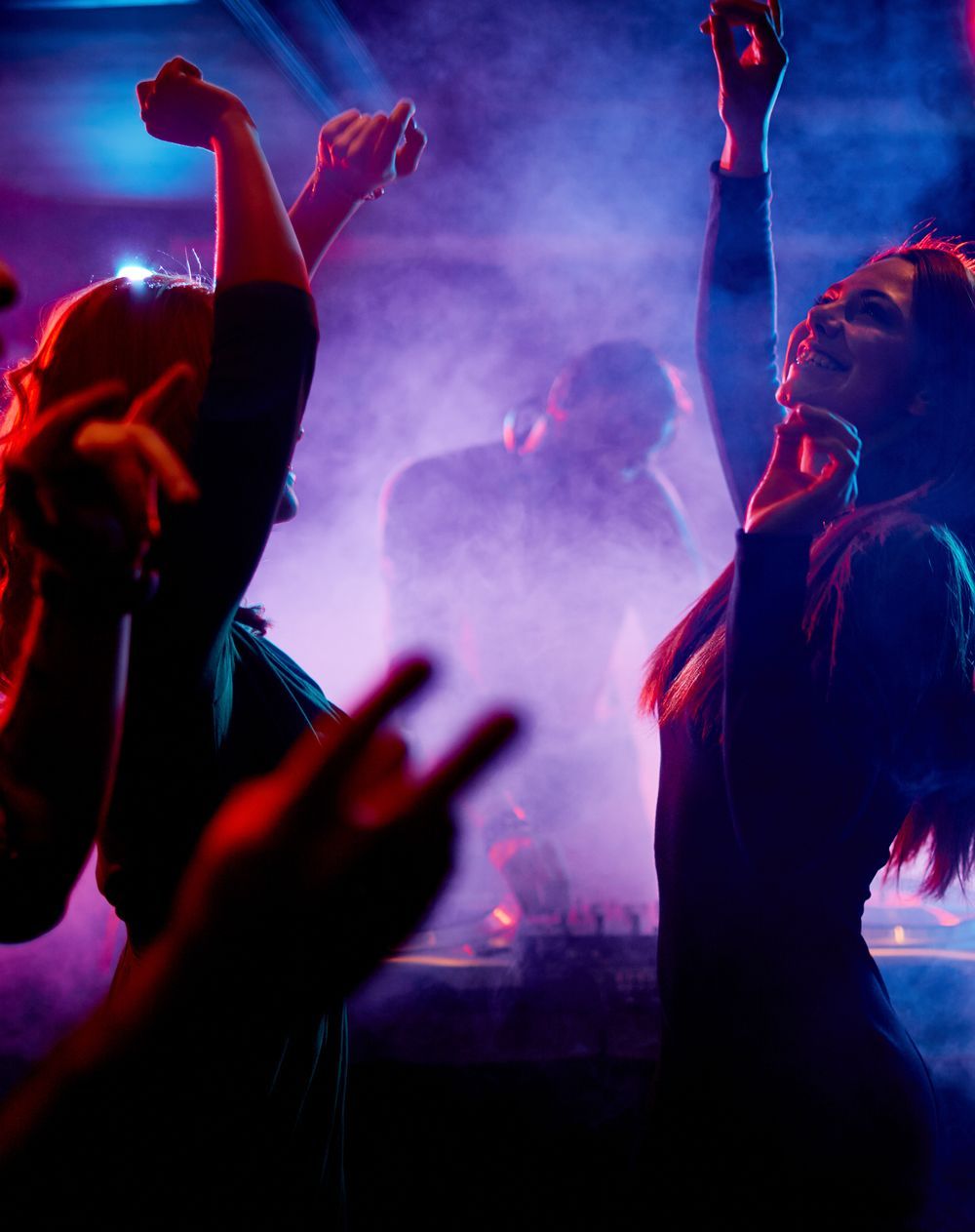 Women Dancing on the DJ's Music