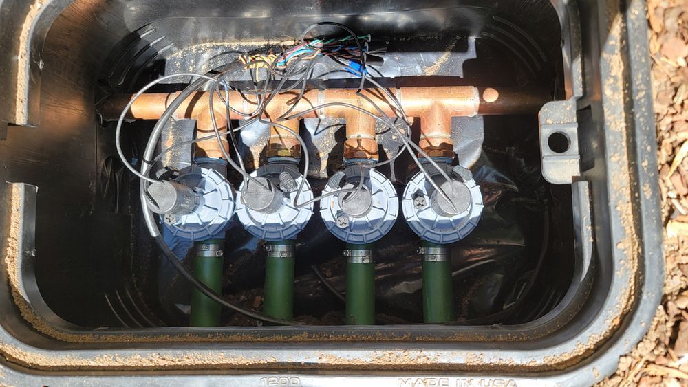 A box with a bunch of water meters inside of it