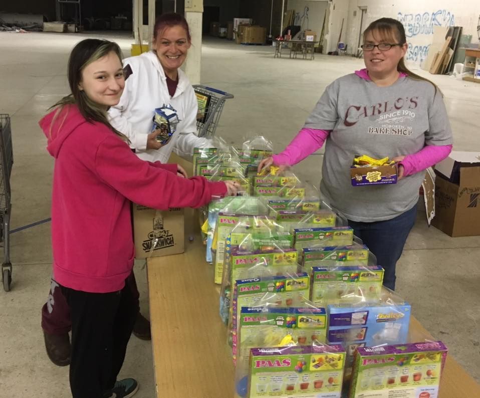 A woman wearing a shirt that says ' cables ' on it