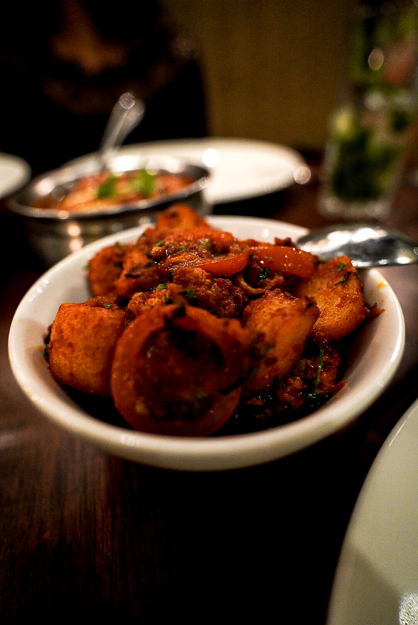 A close up of a bowl of food on a table.