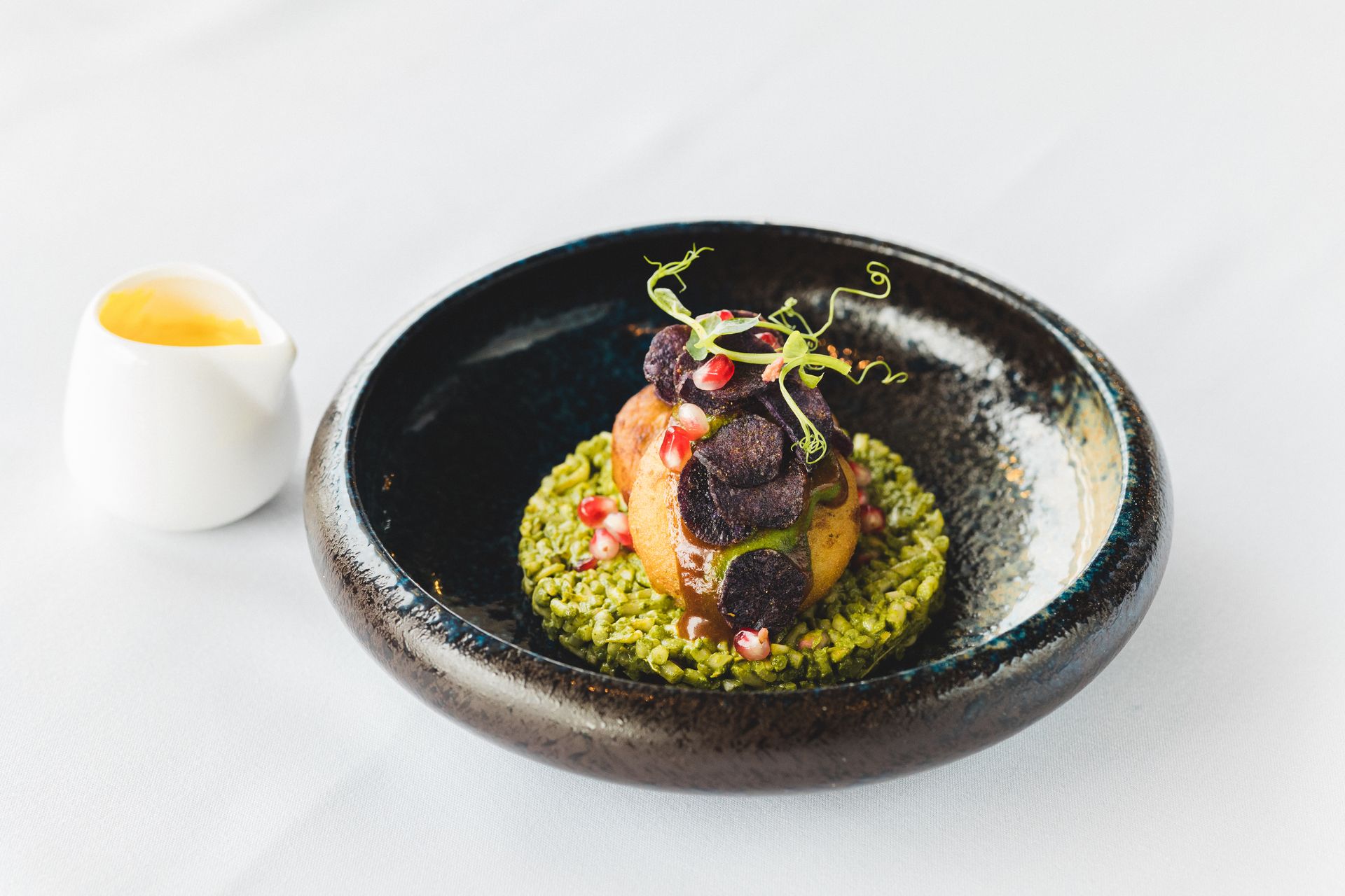 A close up of a plate of food on a table.