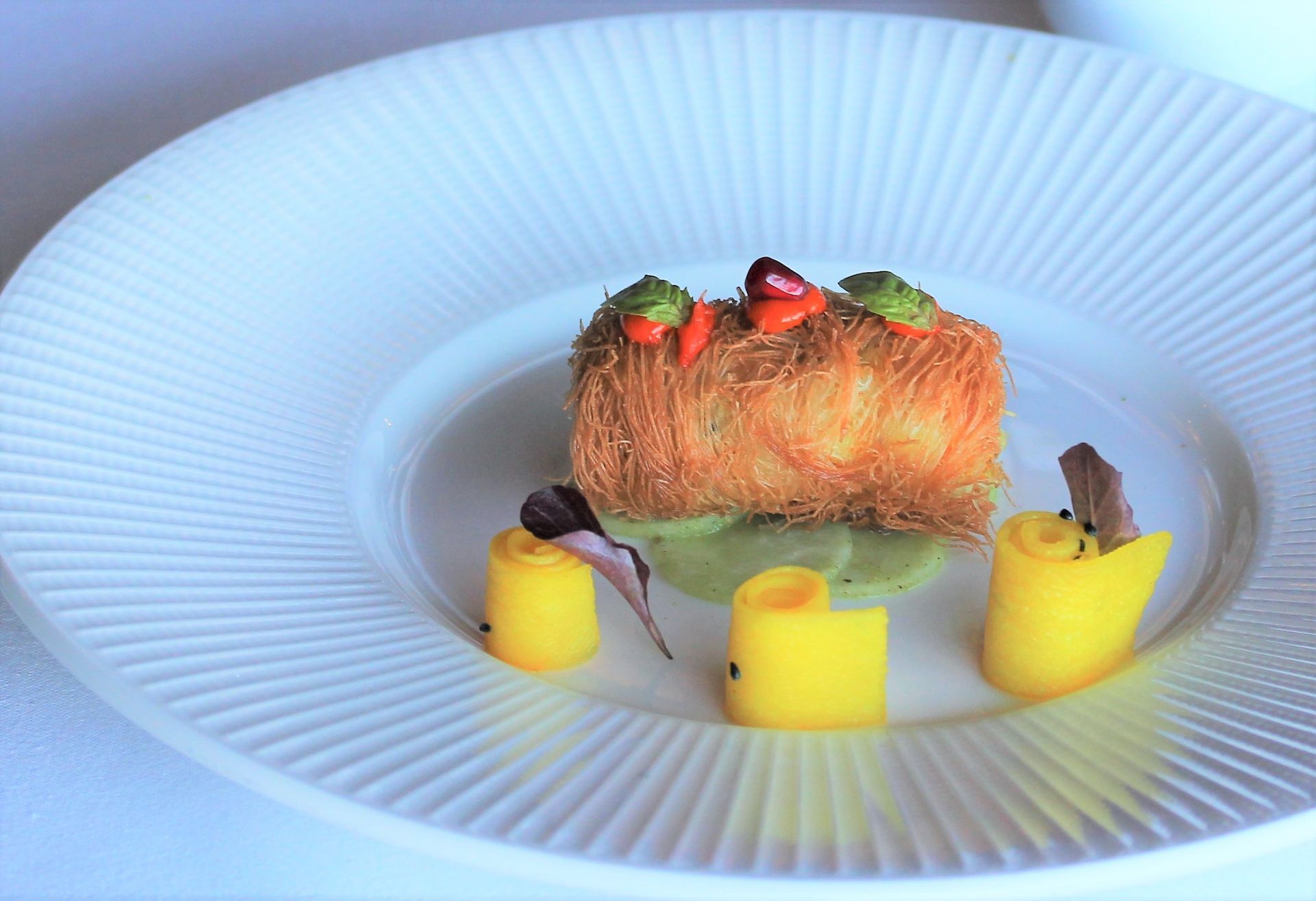 A close up of a plate of food on a table