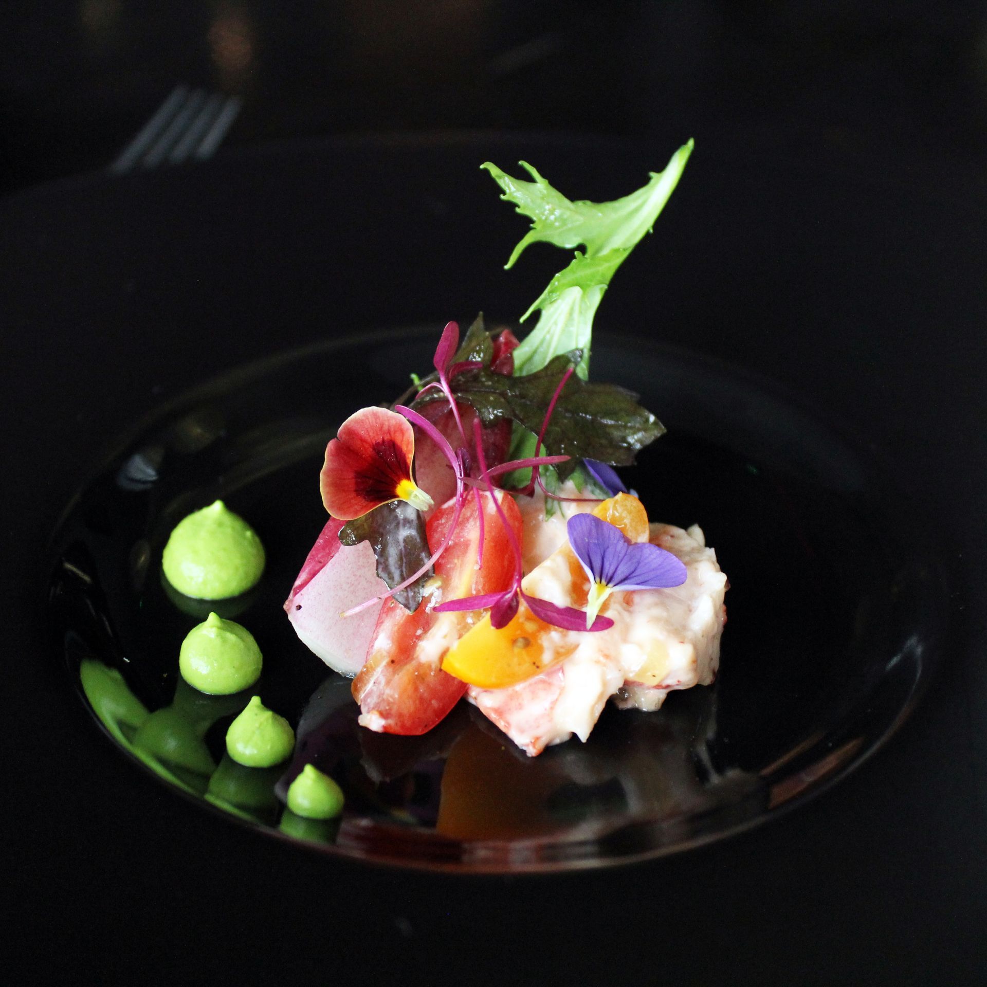 A close up of a plate of food on a table