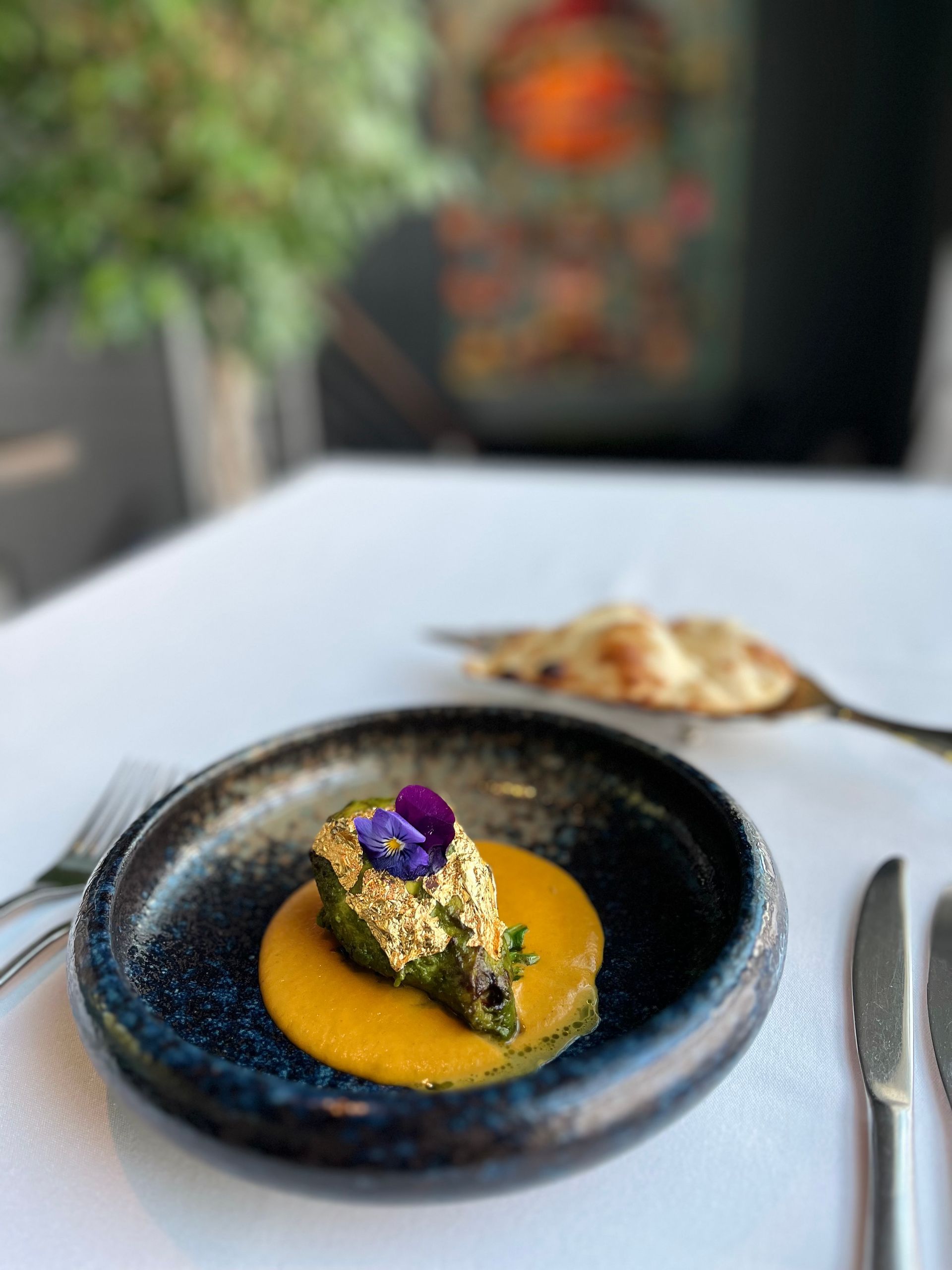 A close up of a plate of food on a table.
