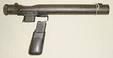 Image of a strange gun with a clip for a handle