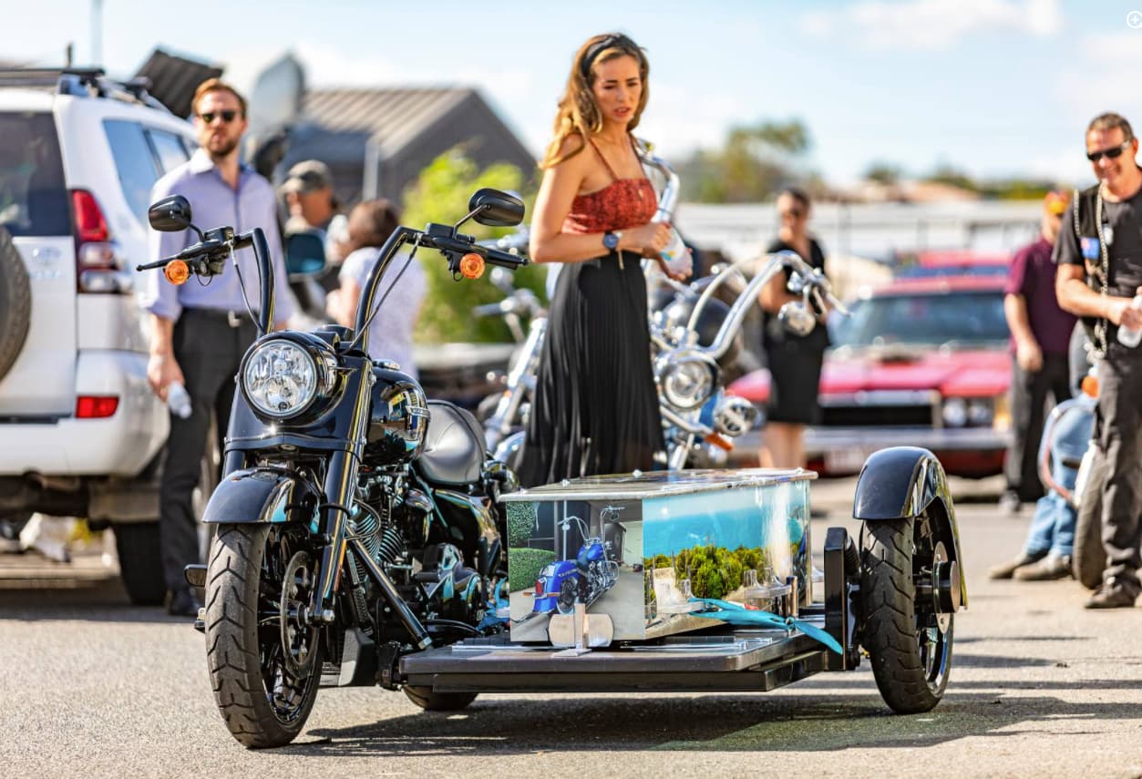 Woman On A Motorbike — Quality Cremation Services in Rockhampton, QLD