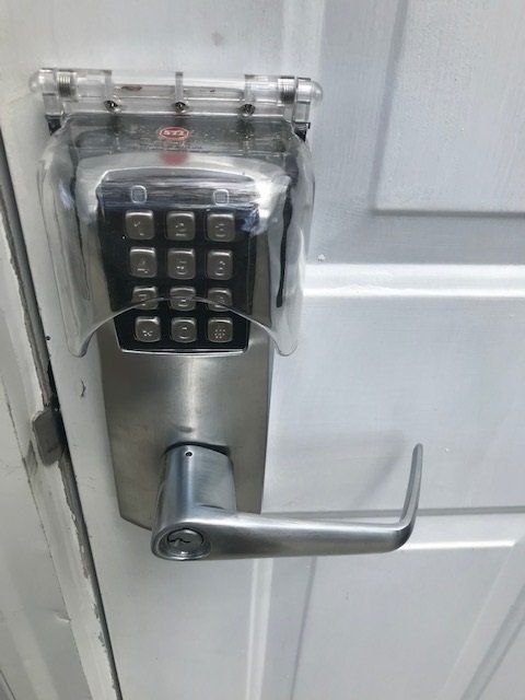 Man Copying Key Car Using Copy Key Machine - Cranberry Township, PA - Cranberry Locksmith