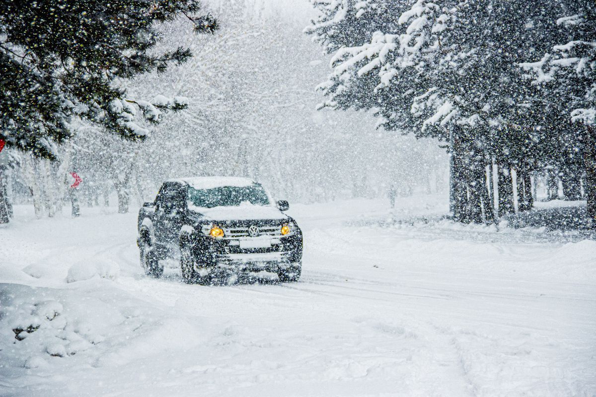 Slippery, ice-covered roads in Maine create hazardous driving conditions during a severe snowstorm