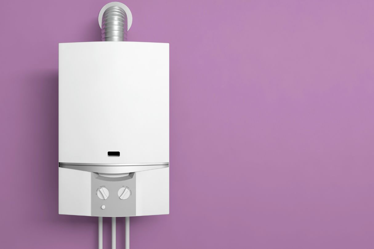 A new, white boiler on a purple wall.