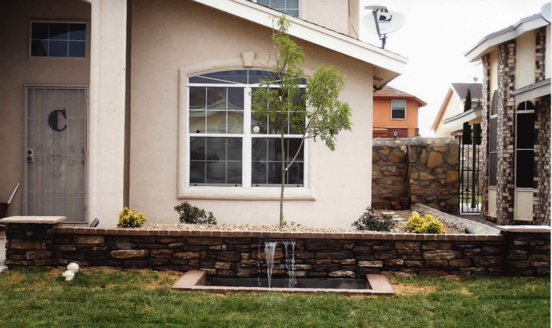 A house with the letter c on the door