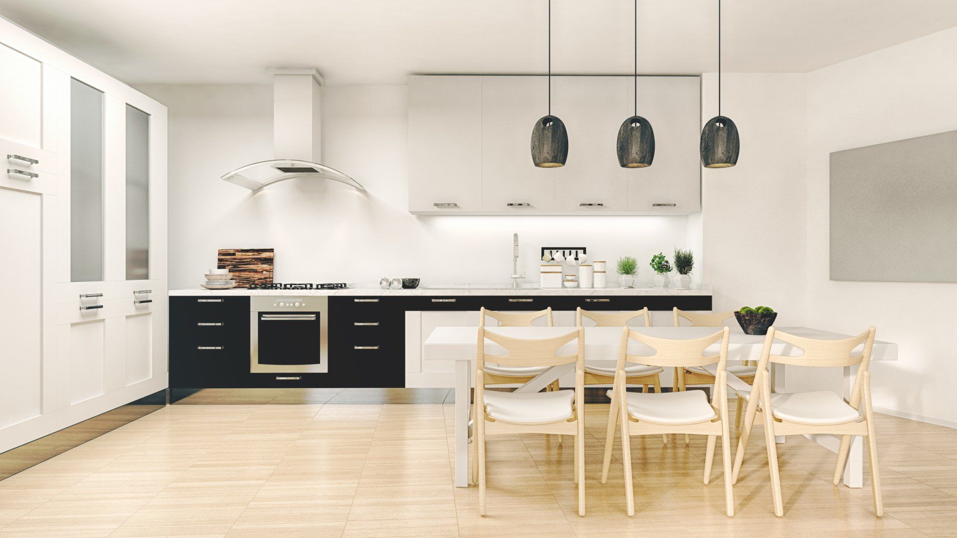 Modern kitchen with black and white cabinets, dining table, and wooden chairs.