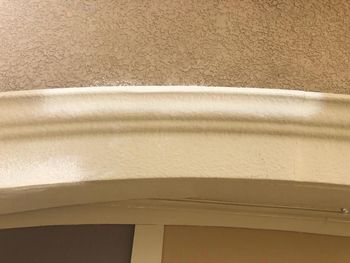 A before and after picture of a white mailbox