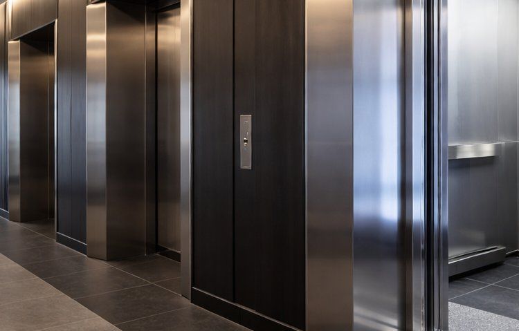 Modern office hallway with elevators