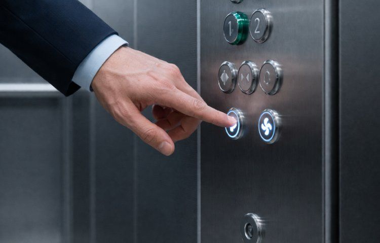 pressing the ground floor button