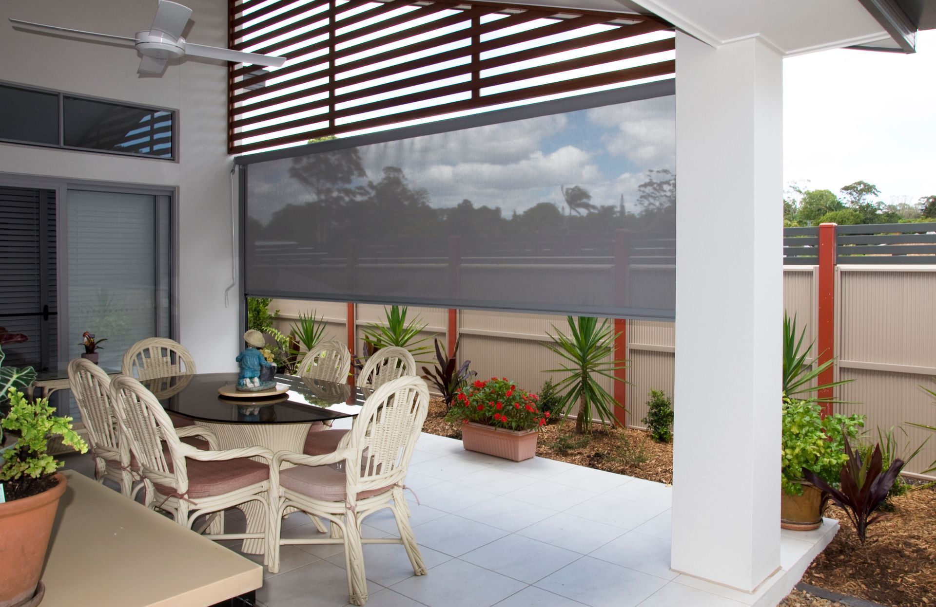 A long awning outside with tables and chairs — Tully Blinds in Tully, QLD