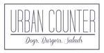 Logo for Urban Counter: text within a rectangle, reads "Urban Counter" above "Dogs. Burgers. Salads" in script.