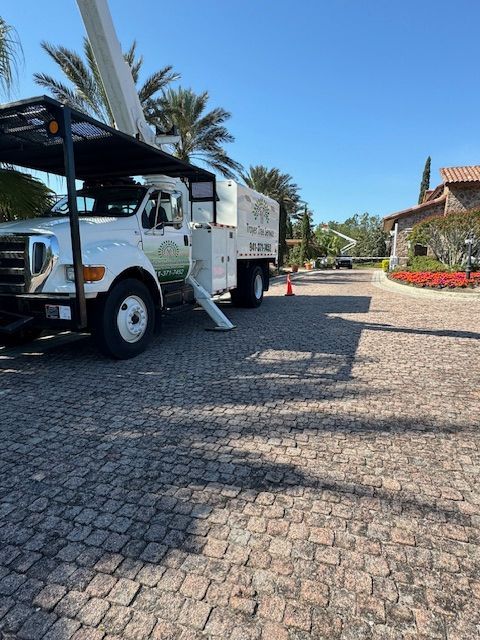 Tree Removal — Machinery Used For Tree Trimming At Work Site In Sarasota, FL