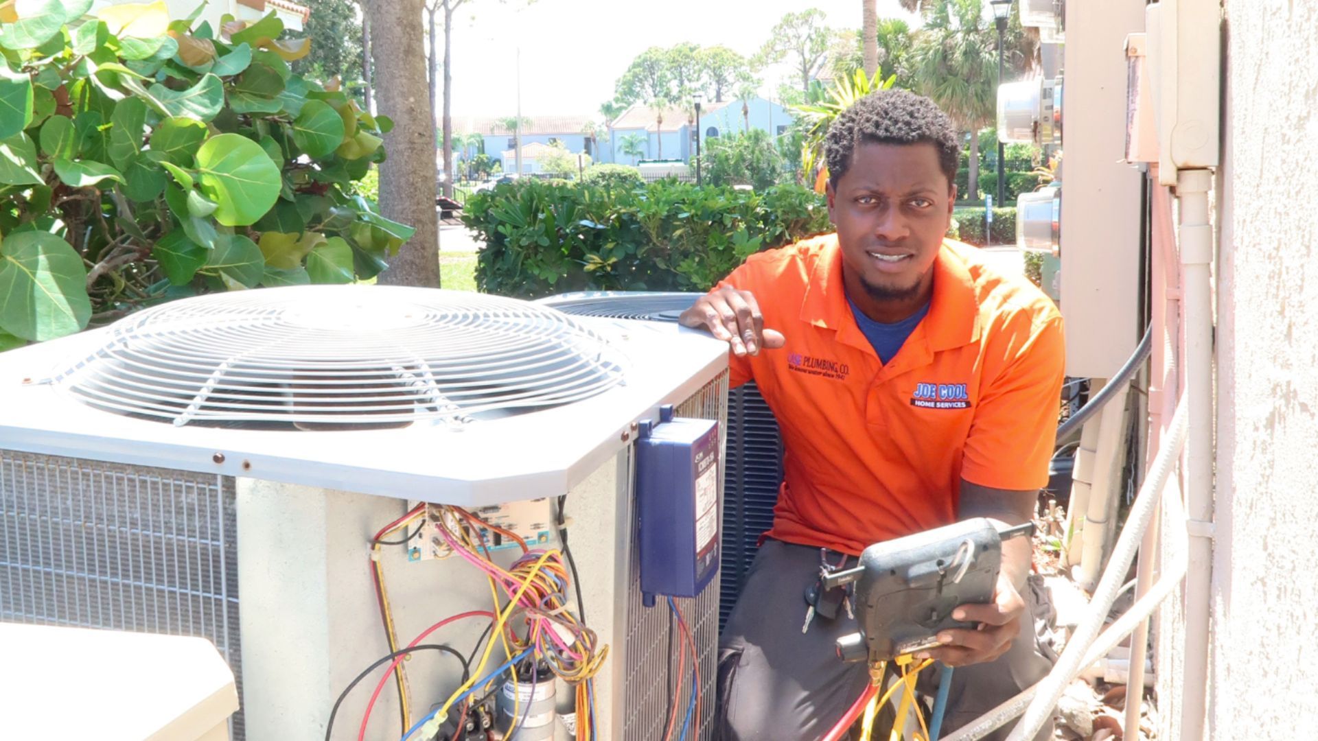 A joe cool van is parked in a parking lot