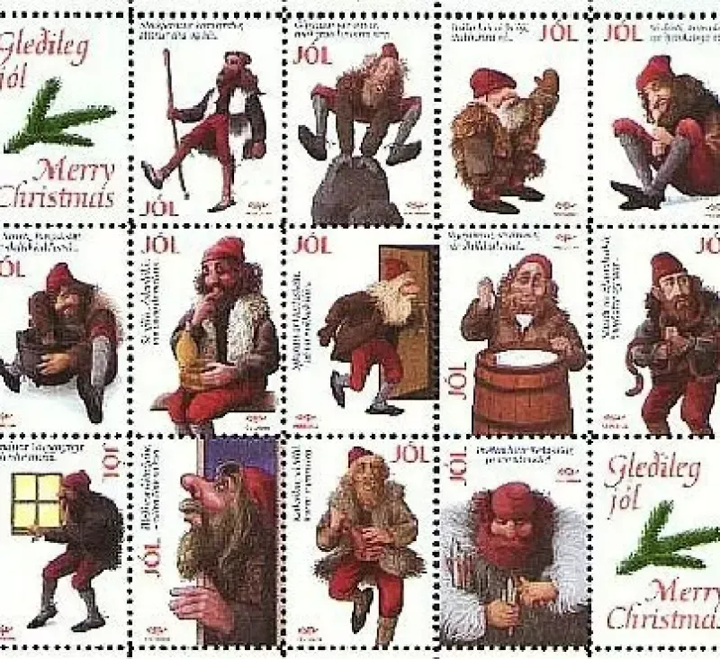 A set of postage stamps that say merry christmas