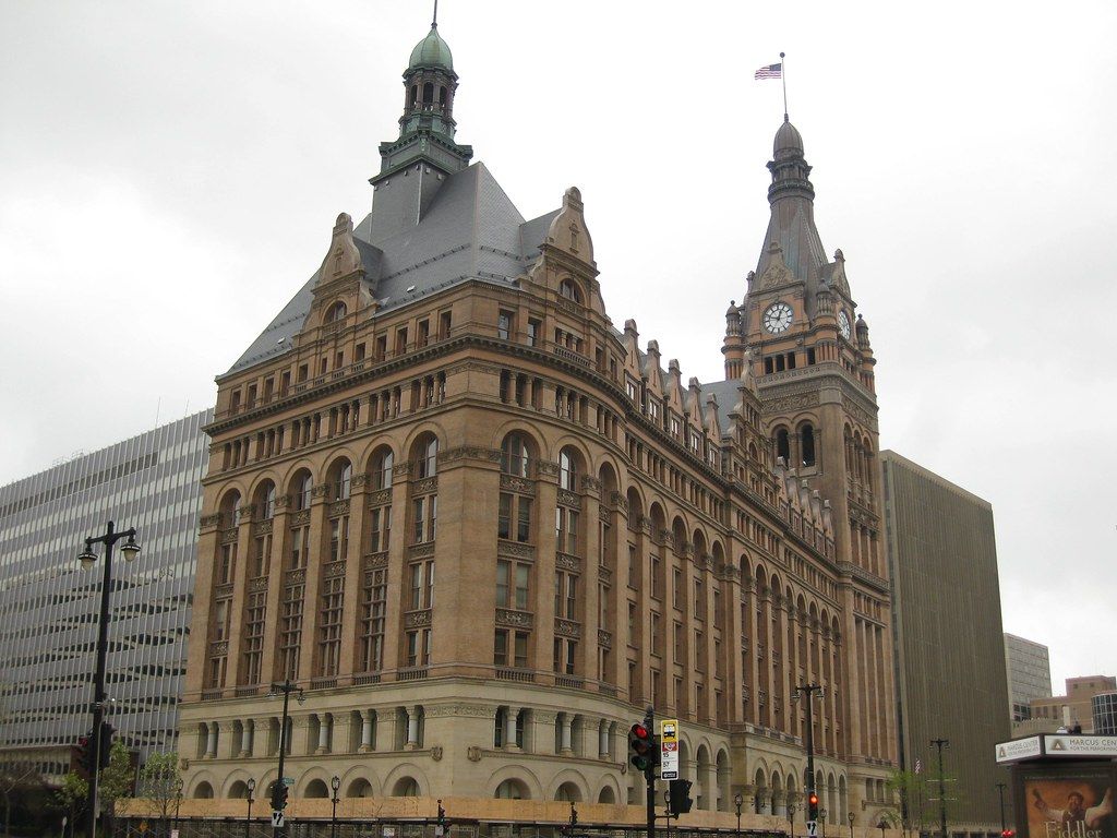 A large building with a clock on top of it