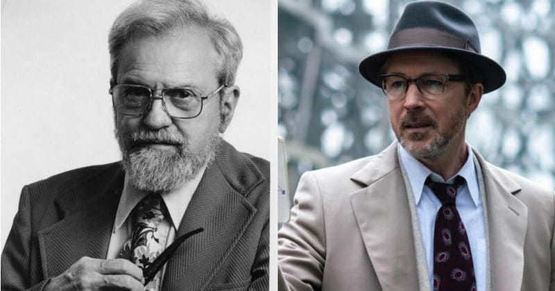 A black and white photo of a man with a beard wearing glasses and a hat.