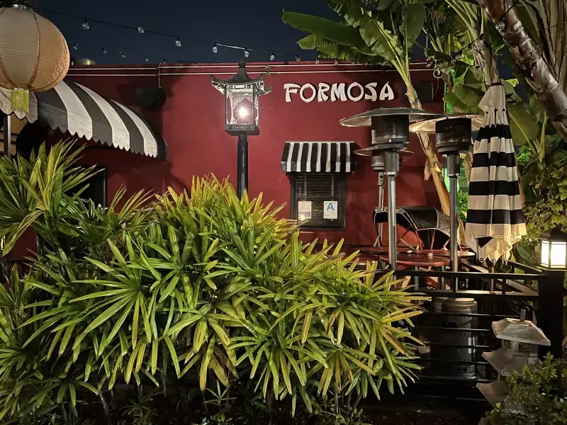 A red building with the name formosa on it