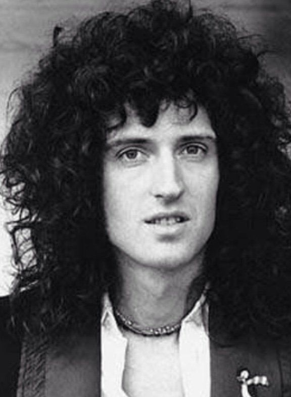 Brian May, the legendary guitarist of Queen and astrophysicist.